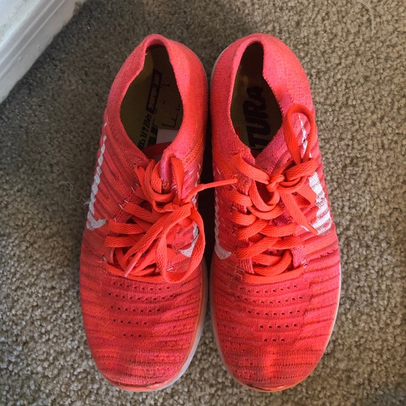 neon orange nike shoes